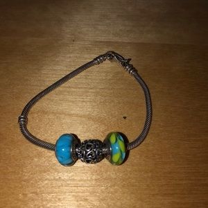Silver pandora bracelet with three beads